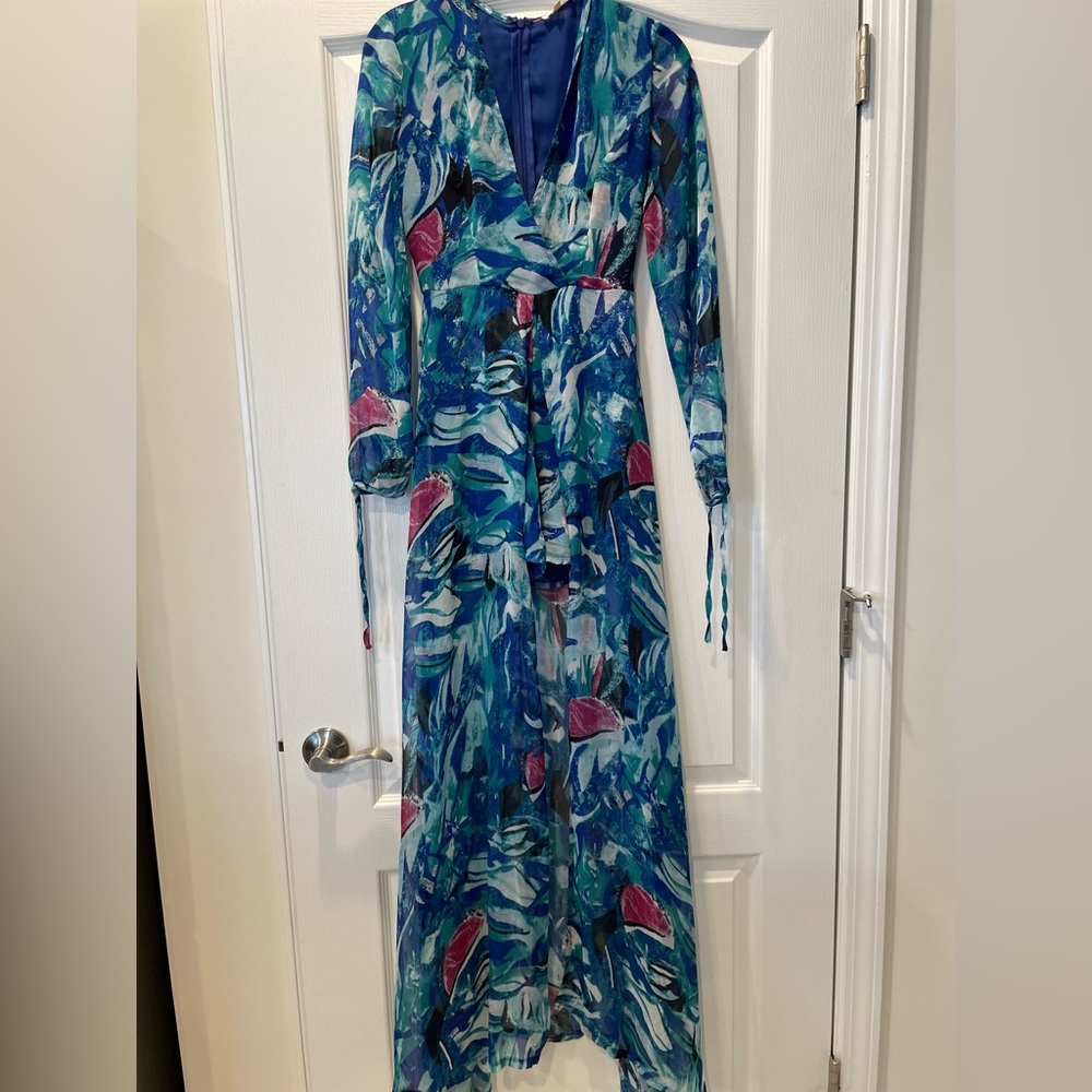 Floral shorts jumpsuit. Size small. New